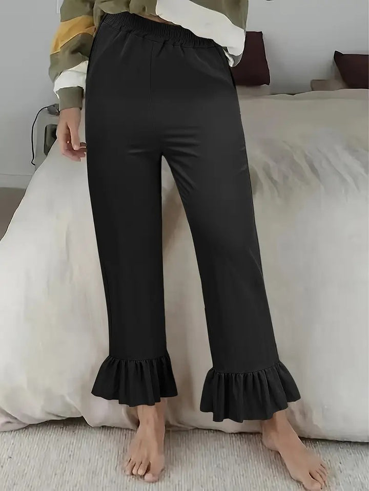 Damen Locker geschnittene Lounge‑Hose aus Jersey mit elastischem Bund und Volant‑Saum – Avélisse