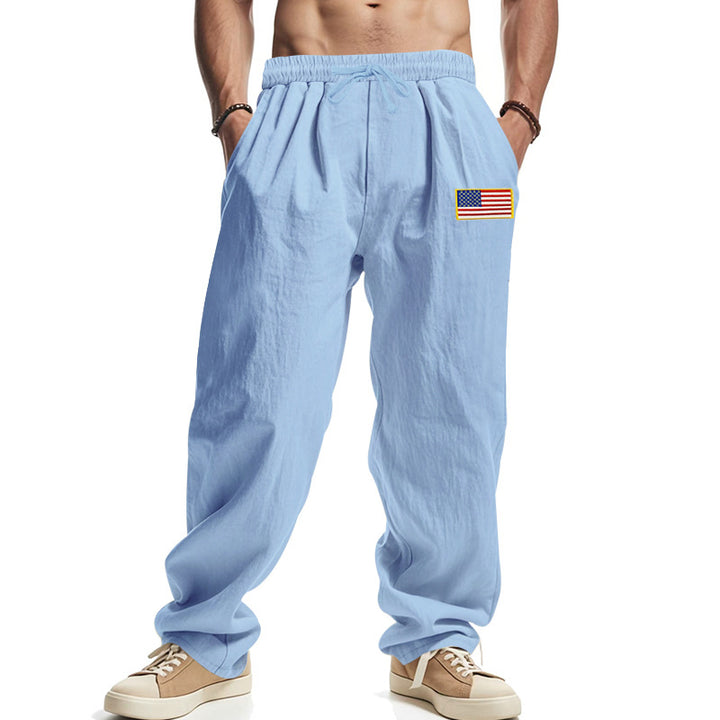 Herren Locker sitzende Freizeit-Hose im Leinen-Look mit elastischem Bund, Kordelzug & Flaggenpatch – Sorevano