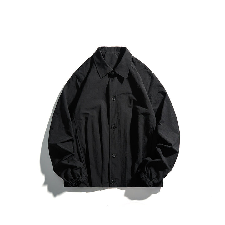 Unisex Leichte Hemdjacke im Boxy-Schnitt mit Holzknopfleiste und elastischen Bündchen Echoarchiv