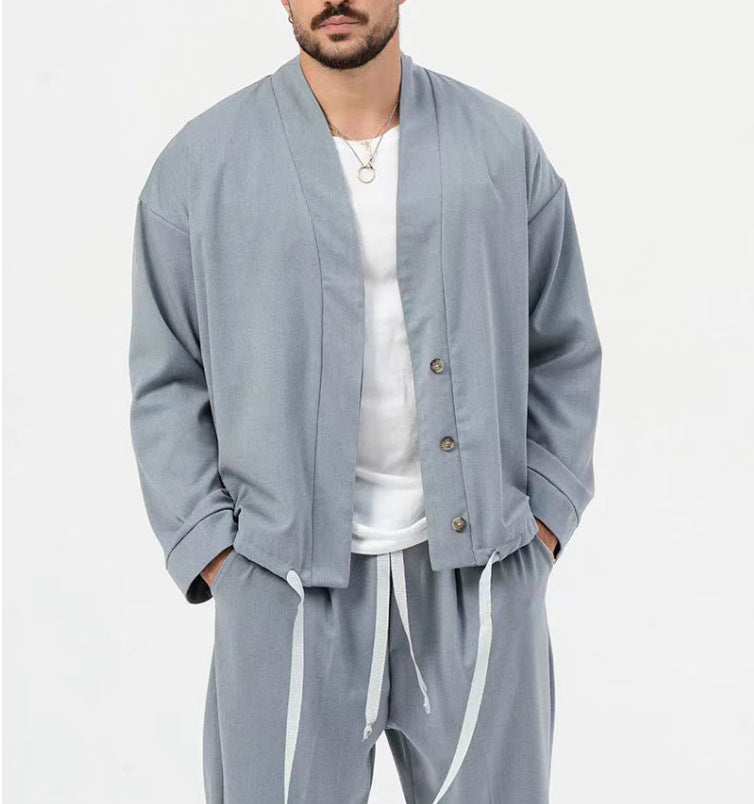 Herren elegantes Kombination aus leichtem Überwurf und lässigen Hosen Echoarchiv