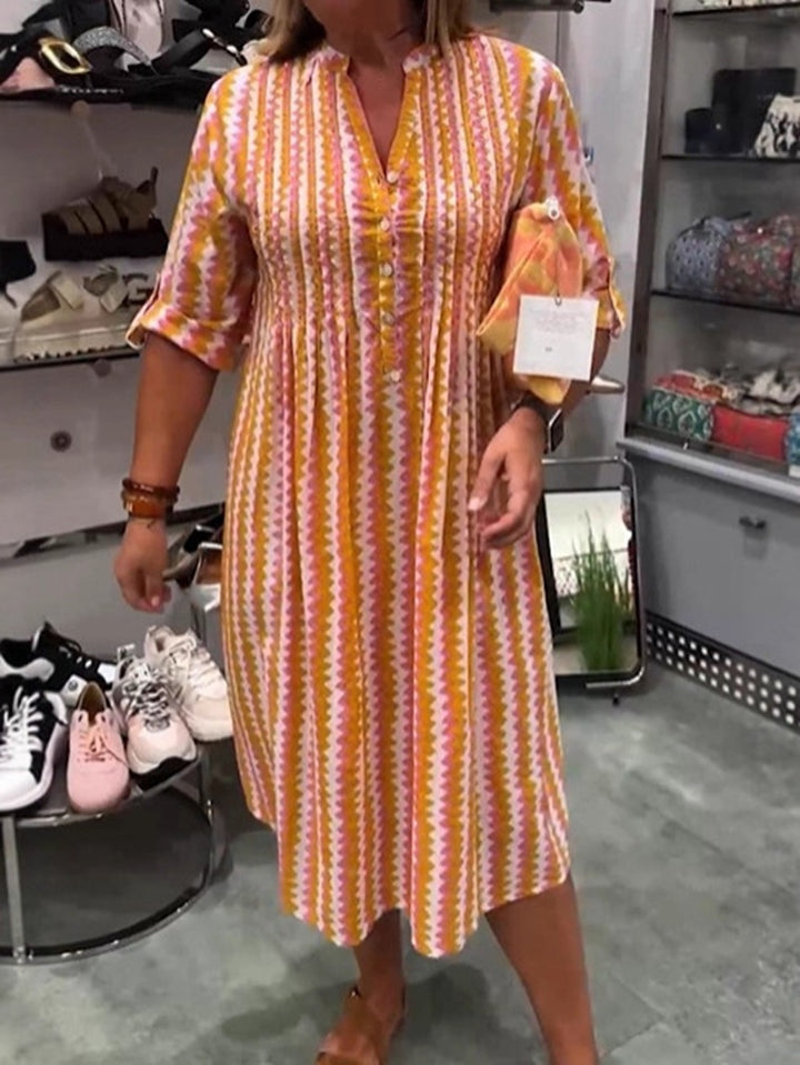 Damen nan Midikleid mit Unterbrustnaht, V-Ausschnitt, Knopfleiste und krempelbaren dreiviertelärmeln Echo Archiv