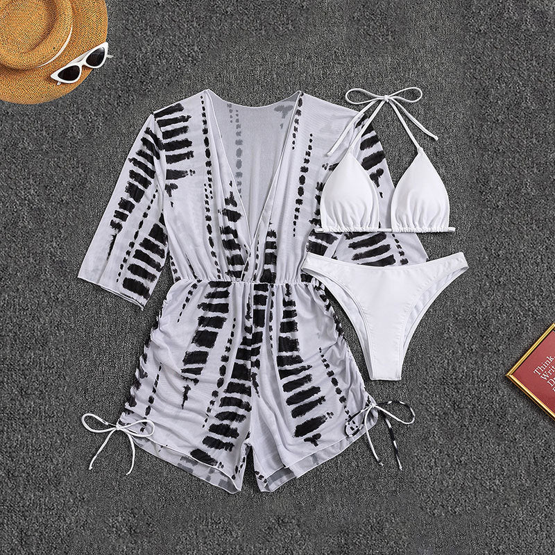 Damen Strandkleid mit tiefem V-Ausschnitt und verstellbaren Rüschendetails Echo Archiv