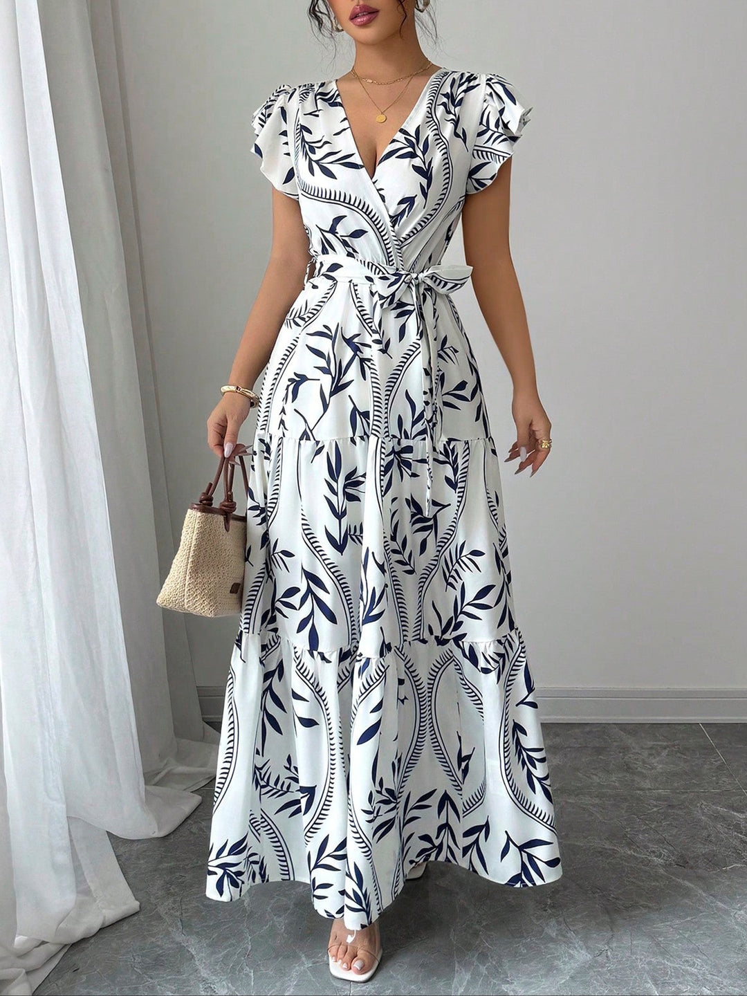 Damen Maxikleid im boho-inspirierten Design mit floralen Elementen und taillierbarem Gürtel Echo Archiv