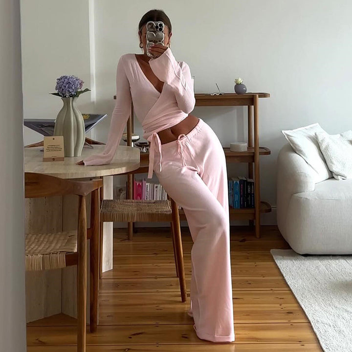 Damen nan Wickel-Cropped-Top mit tiefem V‑Ausschnitt, taillierter Wickelform und langen Glockenärmeln Echo Archiv