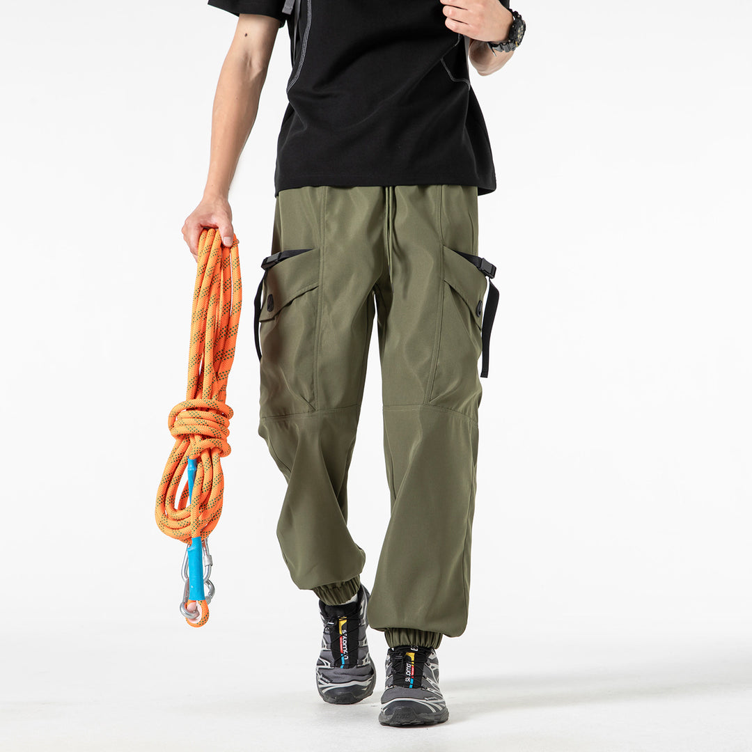 Unisex Weite Technical-Cargo-Jogginghose mit verstellbarem Tunnelzug, großen Klapptaschen und elastischem Knöchelabschluss Echo Archiv