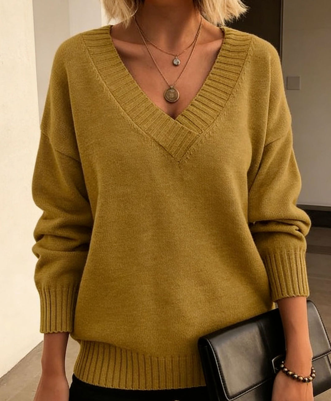Damen Feinstrickpullover mit tiefem V-Ausschnitt und überschnittener Schulter – Mavelle