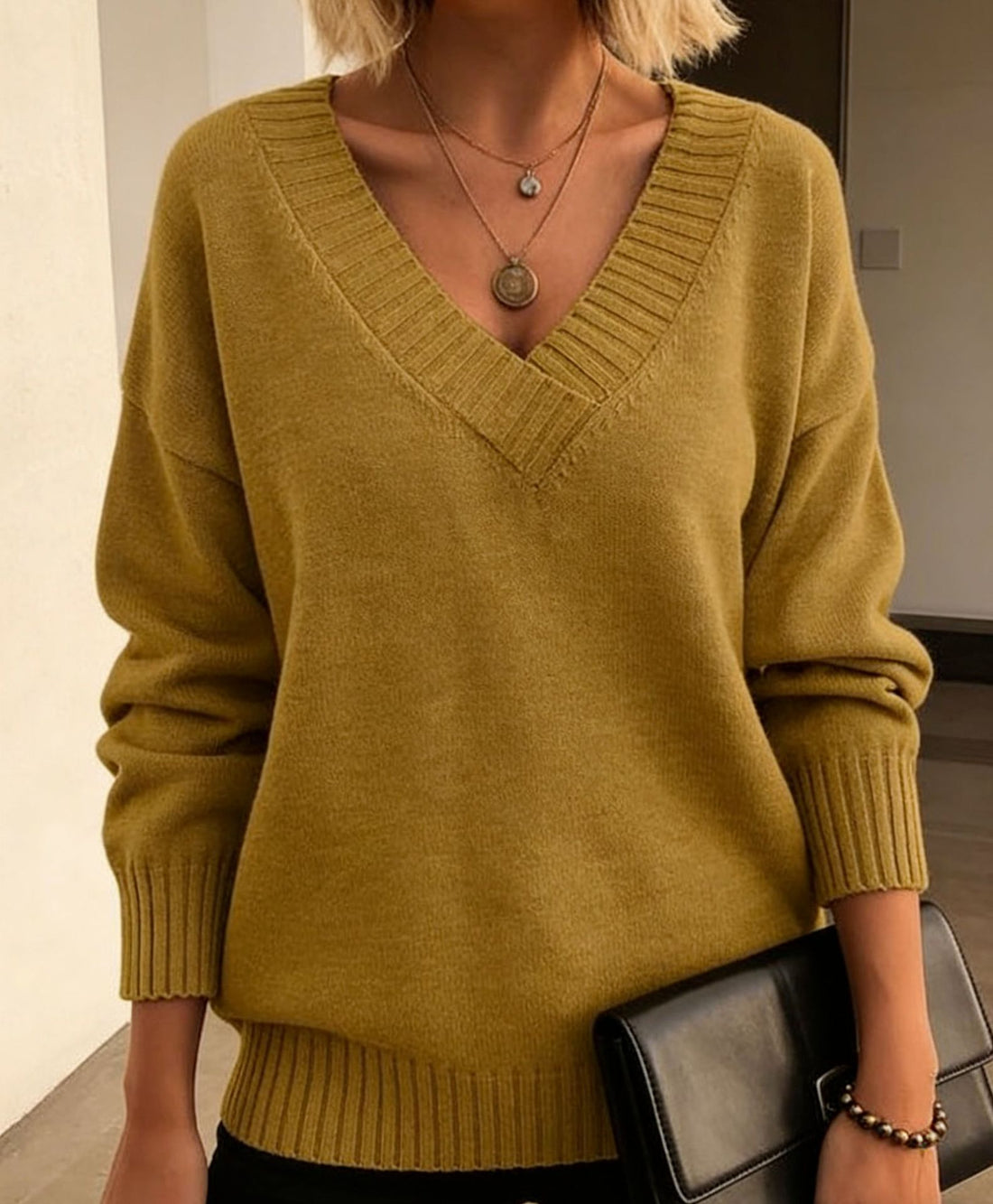 Damen Feinstrickpullover mit tiefem V-Ausschnitt und überschnittener Schulter – Mavelle
