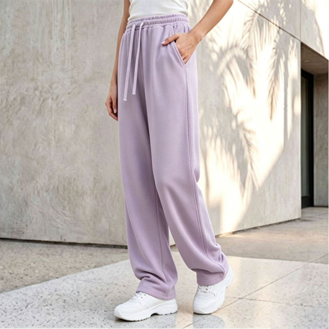 Damen nan weite Loungepalazzo-Hose mit hohem Komfortbund, Kordelzug, seitlichen Eingrifftaschen und dekorativer Seitennaht Echo Archiv