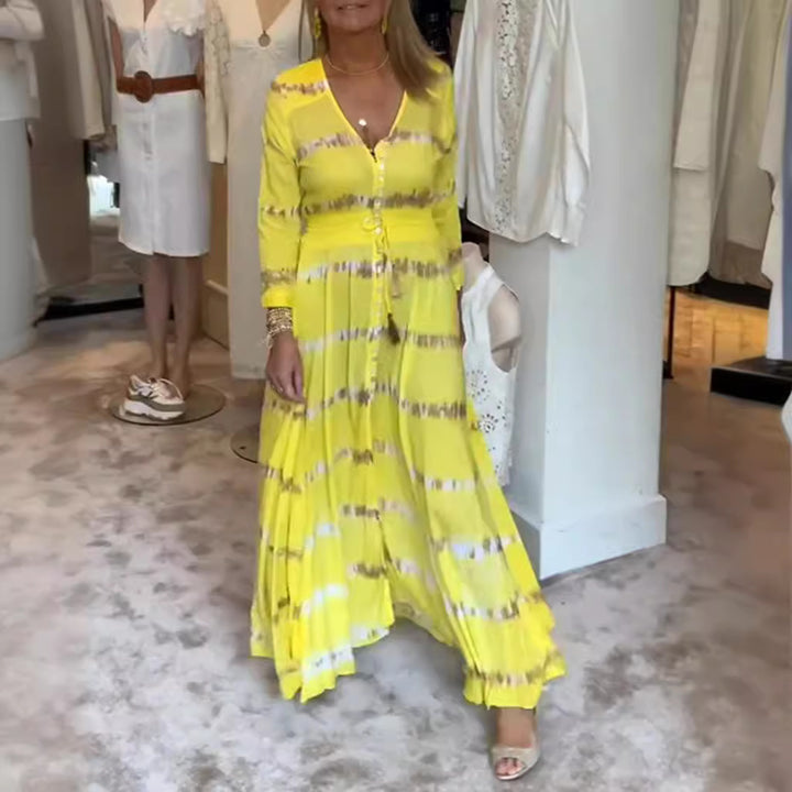 Damen nan fließendes Maxikleid mit V-Ausschnitt, durchgehender Knopfleiste, taillierendem Quastenband und plissiertem Rock Echo Archiv