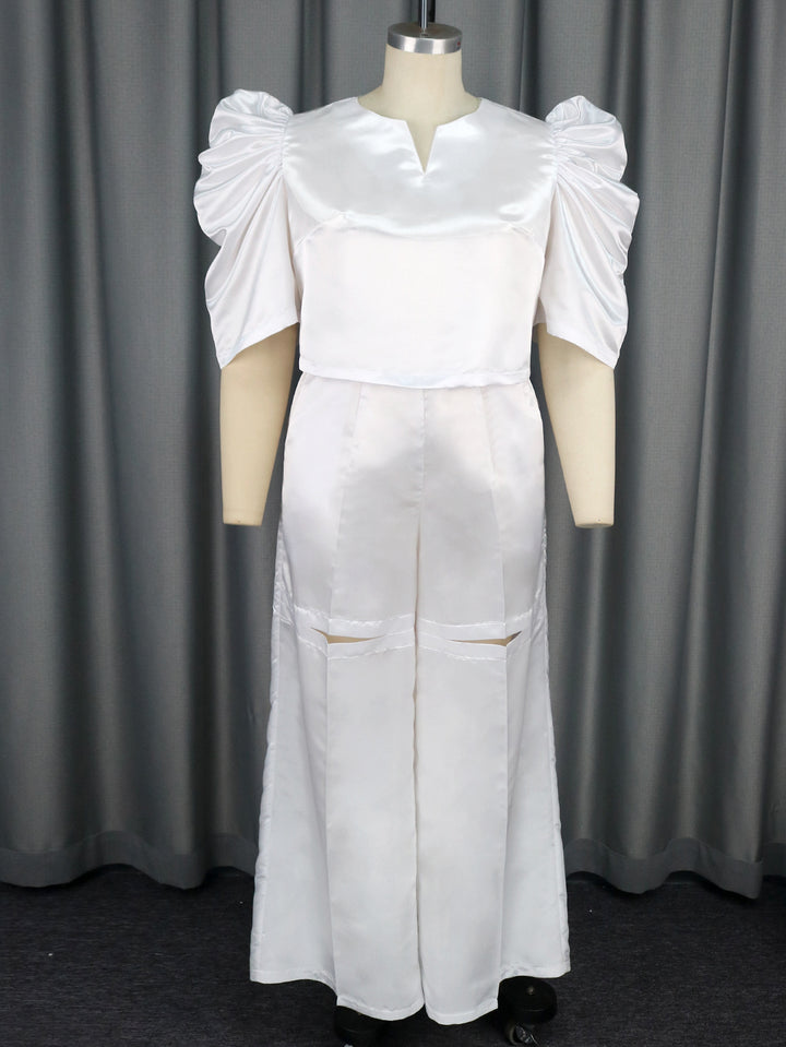 Damen Elegantes Jumpsuit mit voluminösen Puffärmeln und schickem Taillierungsdetail Echo Archiv
