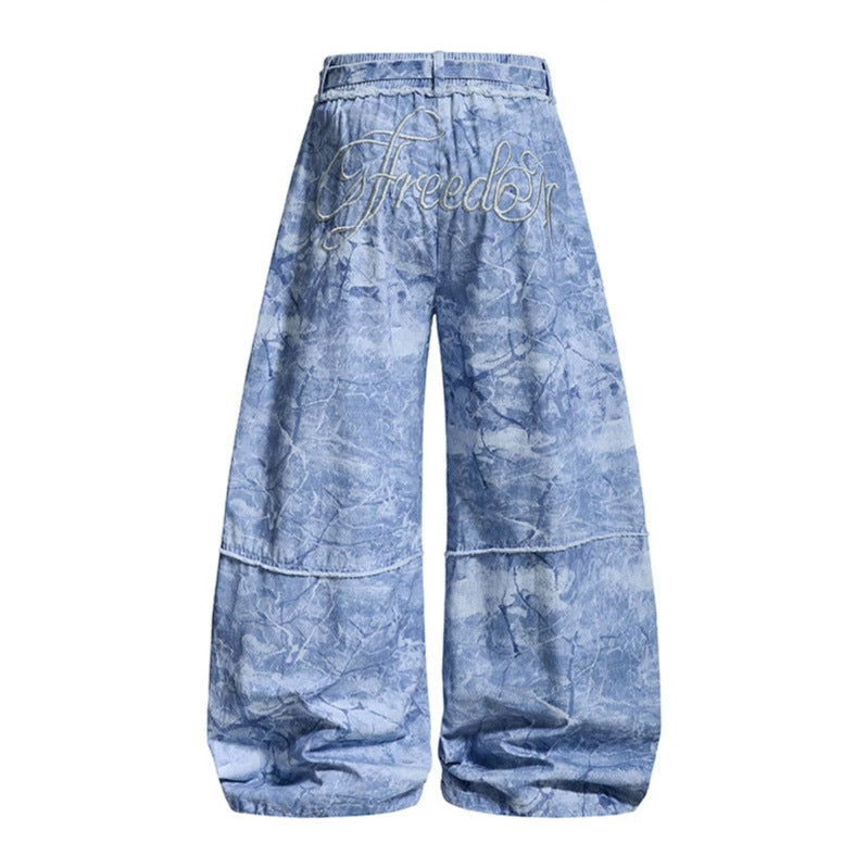 Damen weite Balloon-Jeanshose mit elastischem Bund, langen Zierbändern und Batik-Optik Echoarchiv