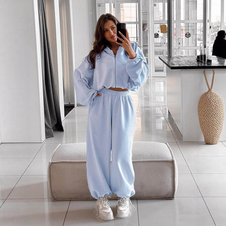 Damen nan oversized Kapuzenjacke mit durchgehendem Reißverschluss und Highwaist Gummibund-Jogginghose Set Echo Archiv