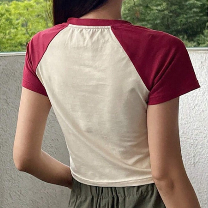 Damen Raglan-Crop-Shirt mit auffälligem Sternmotiv Echo Archiv