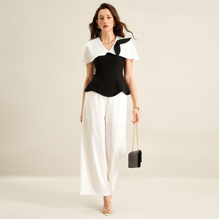 Damen Elegantes Top mit asymmetrischen Ärmeln Echo Archiv