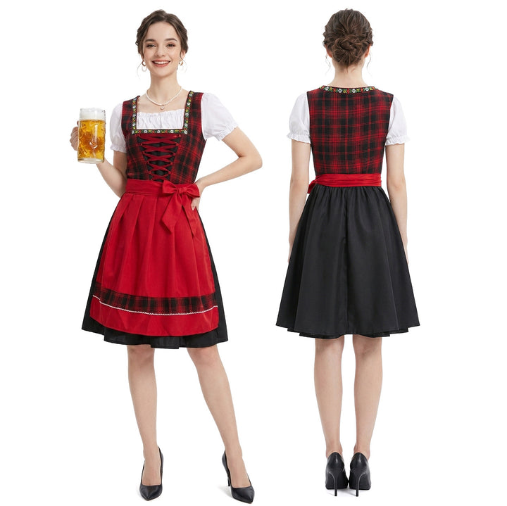 Damen nan klassisches Dirndlkleid mit Schnürmieder, Puffärmeln und knielanger Schürze Echo Archiv