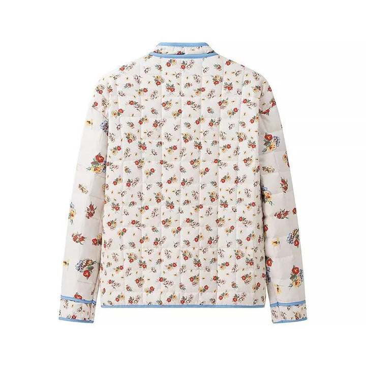 Damen gesteppte Boxy-Jacke mit floralem Alloverprint, kontrastierender Paspel und aufgesetzten Klappentaschen – Célinea