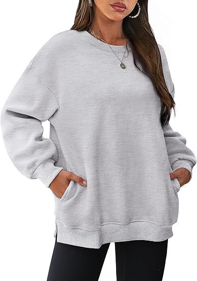 Damen nan lässiger Oversize-Sweatpullover mit seitlichen Eingrifftaschen, geripptem Saum und überschnittener Schulter Echo Archiv