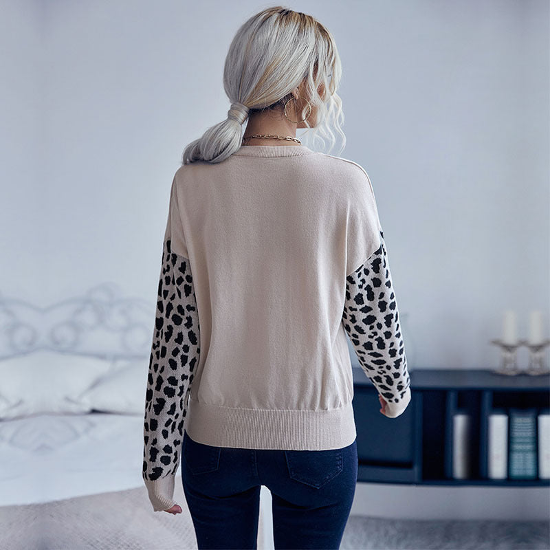 Damen V‑Ausschnitt Feinstrickpullover mit Leo‑Jacquardärmeln und überschnittener Passform Echoarchiv