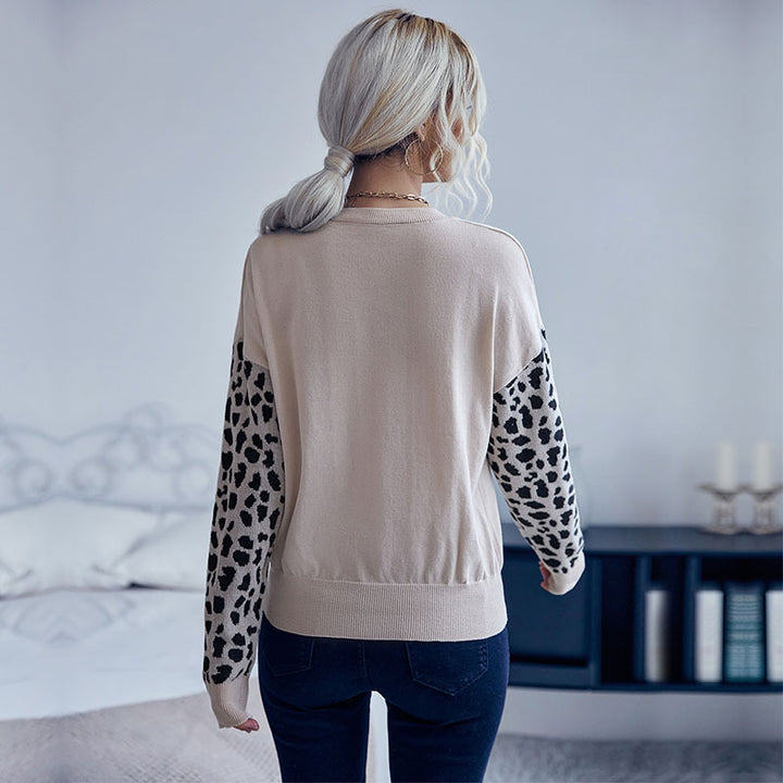 Damen V‑Ausschnitt Feinstrickpullover mit Leo‑Jacquardärmeln und überschnittener Passform Echoarchiv