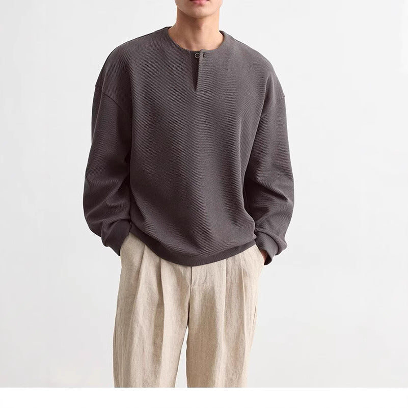 Herren Strukturierter Oversize-Strickpullover mit Henley-Knopfleiste Echoarchiv
