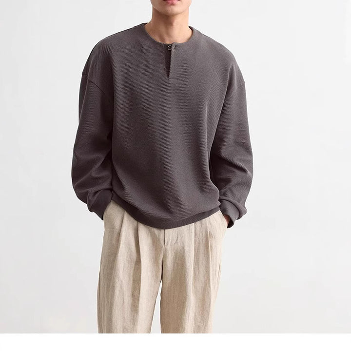 Herren Strukturierter Oversize-Strickpullover mit Henley-Knopfleiste Echoarchiv