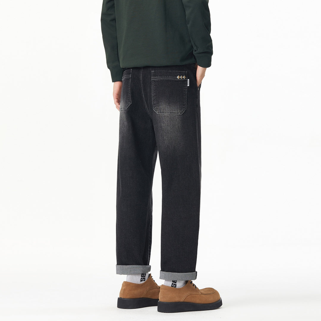 Herren Weite gerade geschnittene Denim-Jeans mit Used‑Wash und Umschlagbund Echoarchiv