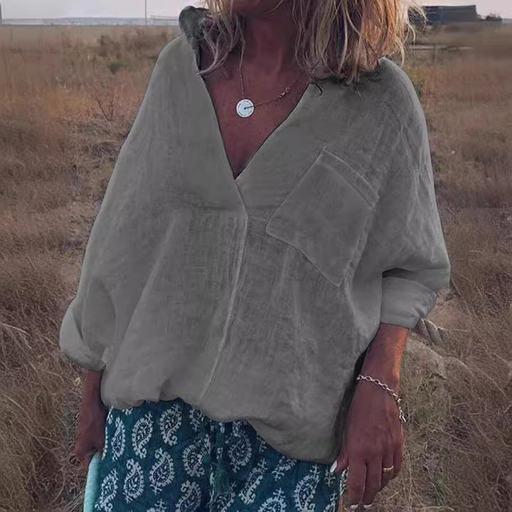 Damen Oversized Leinen-Look Bluse mit tiefem V-Ausschnitt, aufgesetzter Brusttasche und hochgerollten Dreiviertelärmel – Élovi