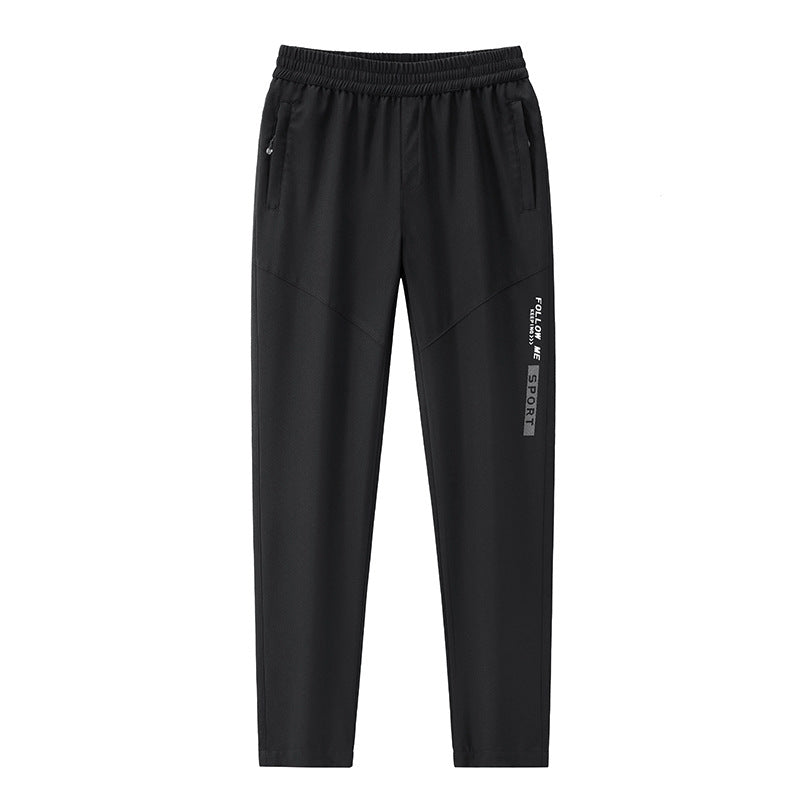 Herren Sportive tapered Jogginghose mit elastischem Bund, Reißverschlusstaschen und atmungsaktivem Funktionsmaterial Echo Archiv