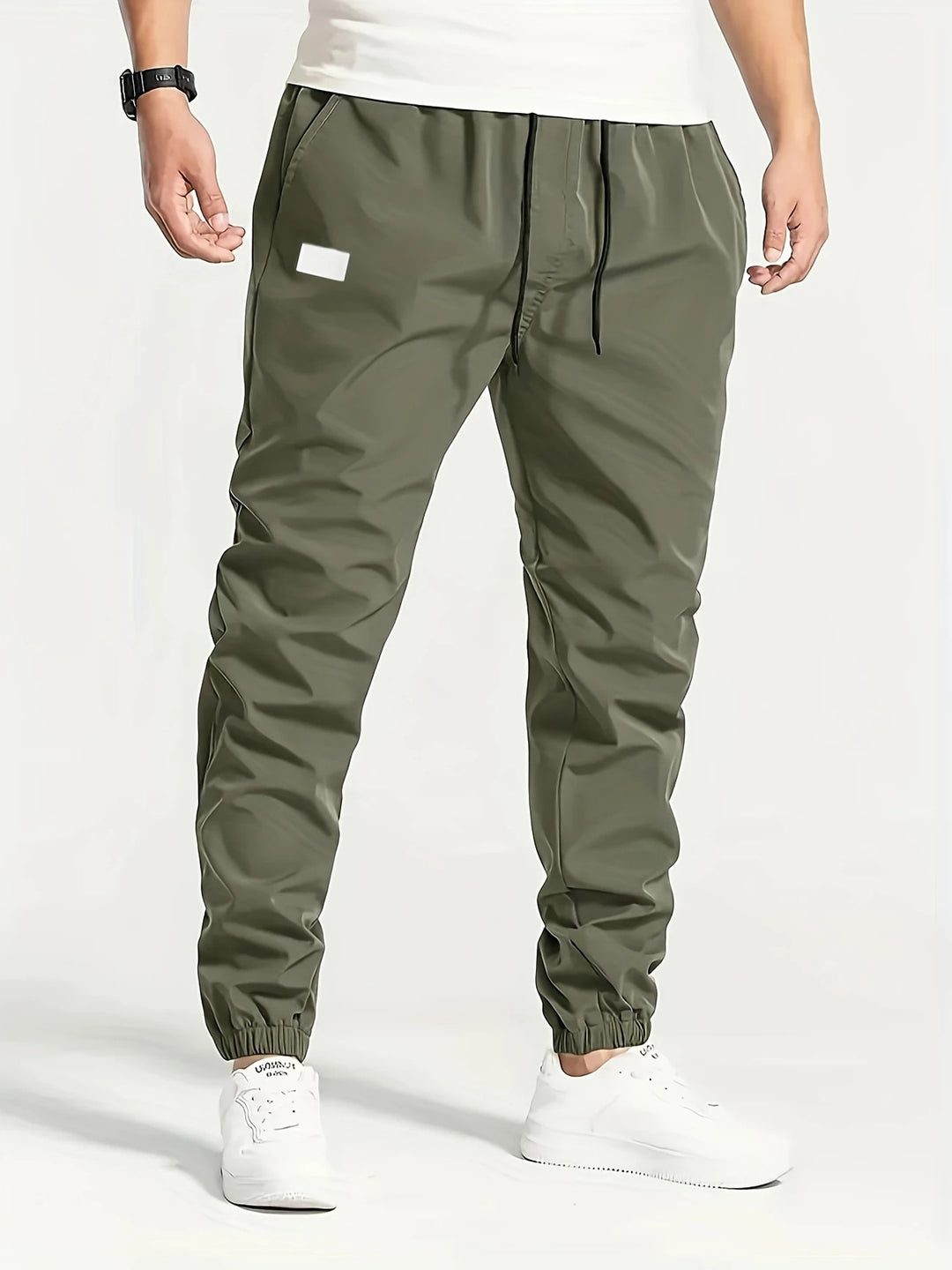 Herren Technische Jogginghose im Tapered‑Utility‑Stil mit elastischem Bund & Knöchelbündchen Echo Archiv