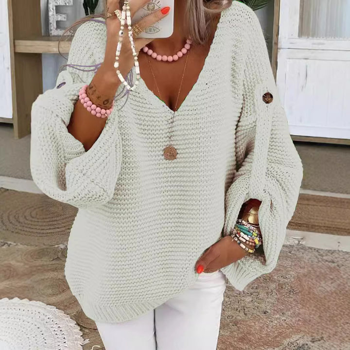 Damen weiter Strickpullover mit V-Ausschnitt, Ballonärmeln und Knopfdetail Echo Archiv
