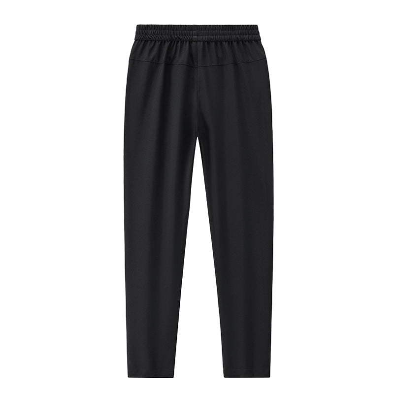 Herren Sportive tapered Jogginghose mit elastischem Bund, Reißverschlusstaschen und atmungsaktivem Funktionsmaterial Echo Archiv