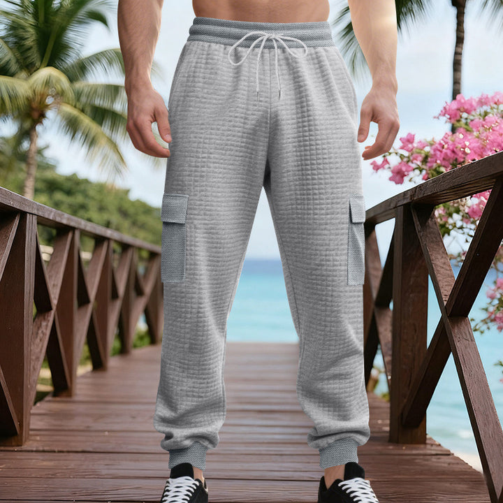 Herren Texturierte Cargo-Jogginghose mit Tunnelzug, aufgesetzten Klappentaschen und gerippten Bündchen – Bravaro