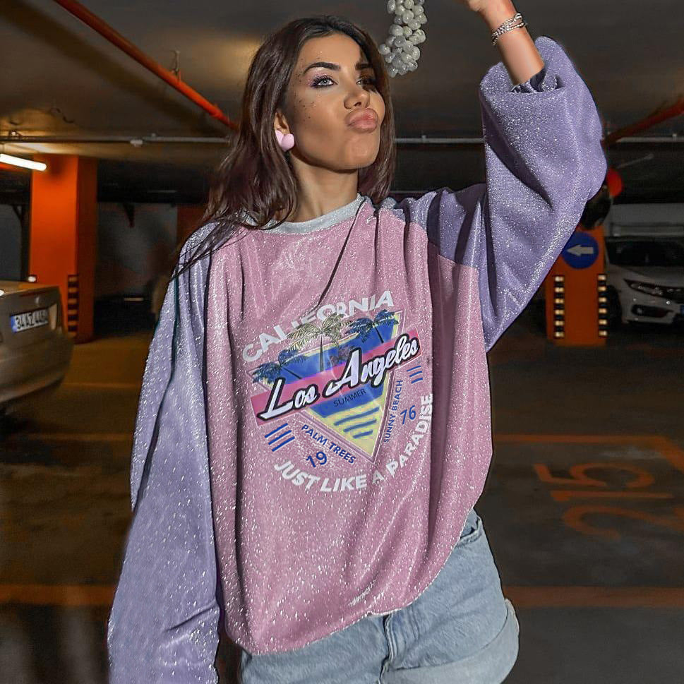Damen Glitzerndes Oversize-Sweatshirt mit Raglanärmeln und Retro-Los-Angeles-Print Echo Archiv