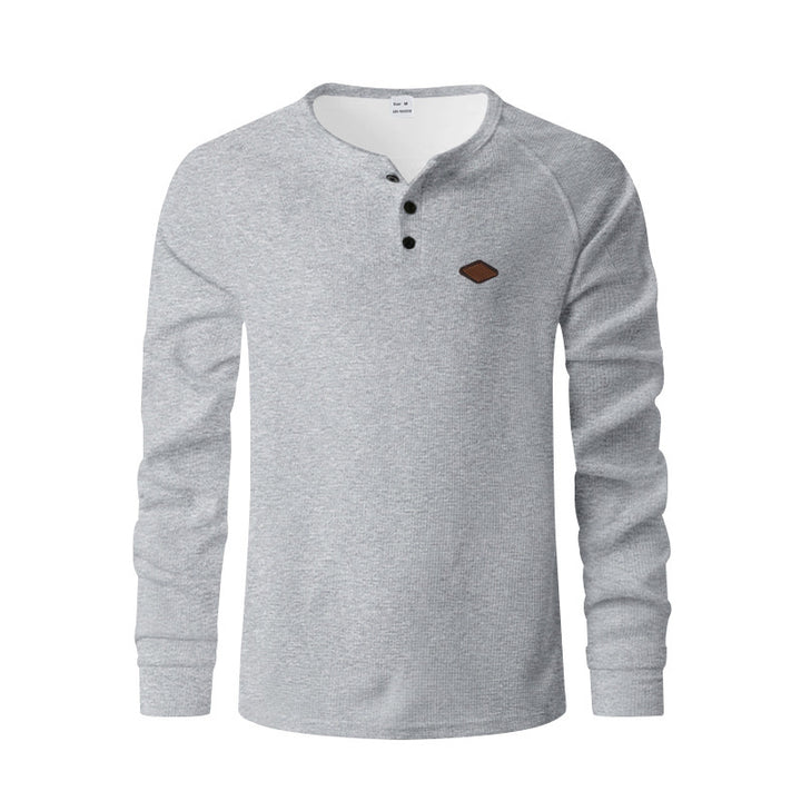 Herren Langarm-Henley-Shirt aus atmungsaktivem Baumwollmix mit strukturiertem Design Echoarchiv