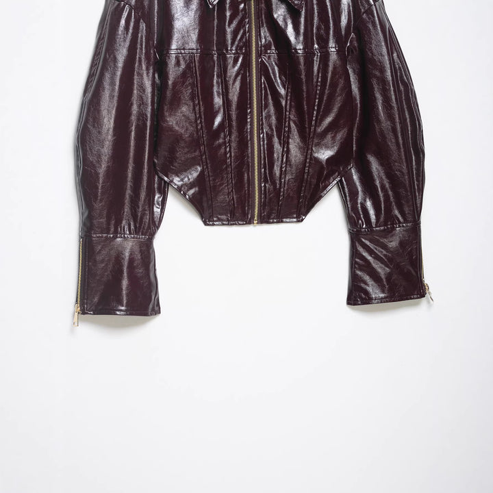 Damen Glänzende Cropped Bikerjacke in Lackoptik mit Schulterklappen und Zip-Ärmeln Echoarchiv
