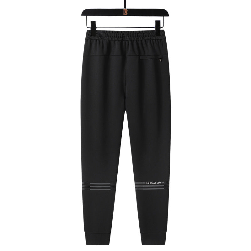 Herren Sportliche konisch zulaufende Jogginghose mit Elastbund, Kordelzug & Reißverschlusstaschen Echoarchiv
