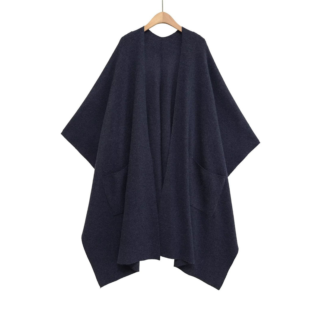 Damen Oversize Strickponcho mit Eingrifftaschen und asymmetrischem Saum Echo Archiv
