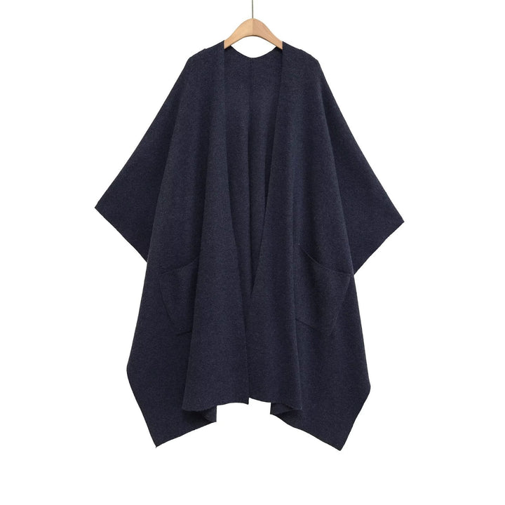 Damen Oversize Strickponcho mit Eingrifftaschen und asymmetrischem Saum Echo Archiv