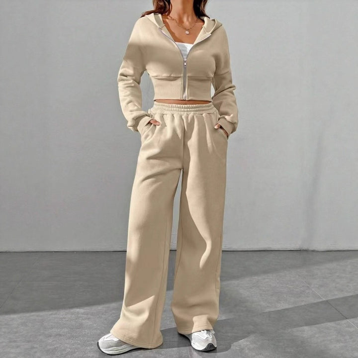 Damen nan kurzes Kapuzen-Sweatshirt mit Reißverschluss und weite High-Waist Jogginghose Echo Archiv