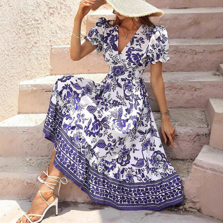 Damen nan boho-inspiriertes Maxikleid mit geraffter Empire-Taille, kurzen Puffärmeln und dekorativem Bordürenprint Echo Archiv