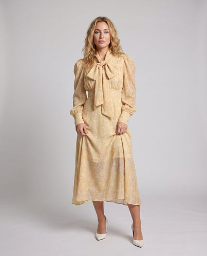 Damen Geblümtes Maxikleid mit Schleifenkragen und Puffärmeln Echo Archiv