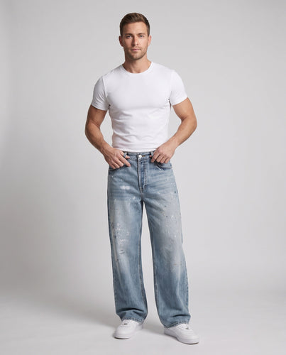 Herren weit geschnittene Vintage-Denim Jeans mit Used-Effekten und Paint-Splatter Echo Archiv
