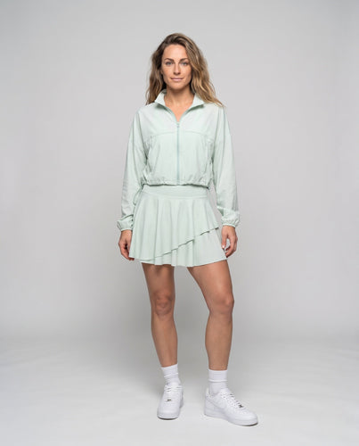 Damen nan sportive Kurzjacke aus funktionalem Jersey mit verdecktem Reißverschluss und elastischen Bündchen Echo Archiv