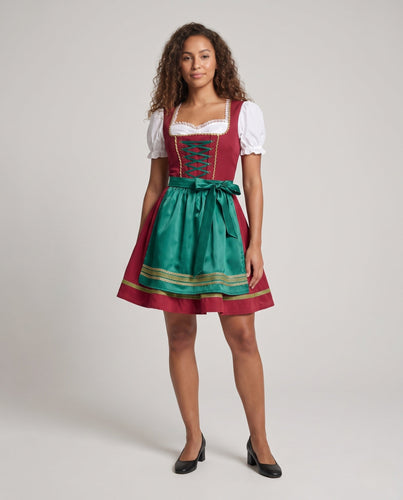 Festliches traditionelles Damenkleid mit floralen Akzenten Echo Archiv