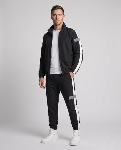 Herren leichter sportlicher Trainingsanzug mit Windbreaker, reflektierenden Einsätzen und schmal zulaufenden Jogginghosen