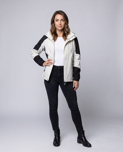 Damen Leichte Wasserdichte Outdoorjacke mit Kapuze Atmungsaktive Membran und Versteckten Reißverschlüssen Echoarchiv