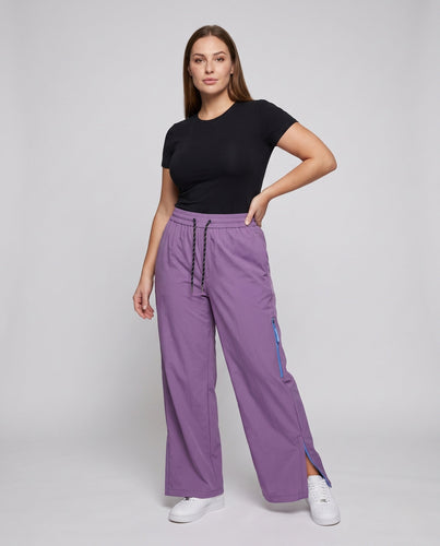 Damen weite Palazzo-Hosen mit hoher Taille, elastischem Zugband und seitlichem Reißverschlussdetail Echoarchiv