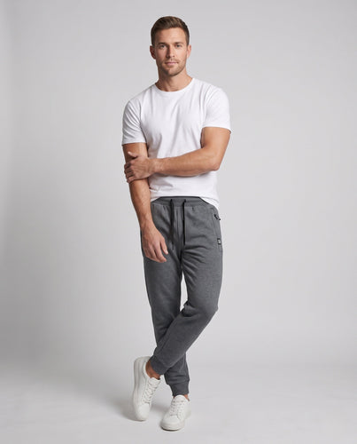 Herren konische Performance Jogginghose aus funktionellem Fleece mit elastischem Bund, Kordelzug und Reißverschluss-Taschen Echoarchiv