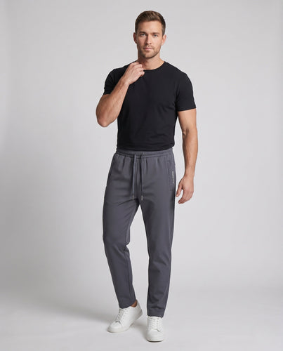 Herren Tapered Funktions-Jogginghose mit Tunnelzug, Reißverschlusstaschen und Knöchelreißverschluss Echoarchiv