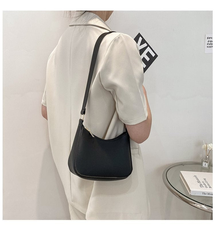 Echoarchiv | Luxuriöse Retro-Tasche Exklusive Lederhandtasche mit Zeitlosem Charme